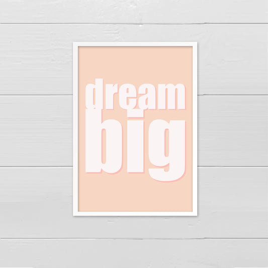 Portrait style print with the words Dream Big printed in large lowercase letters in cream, onto a pale pink background